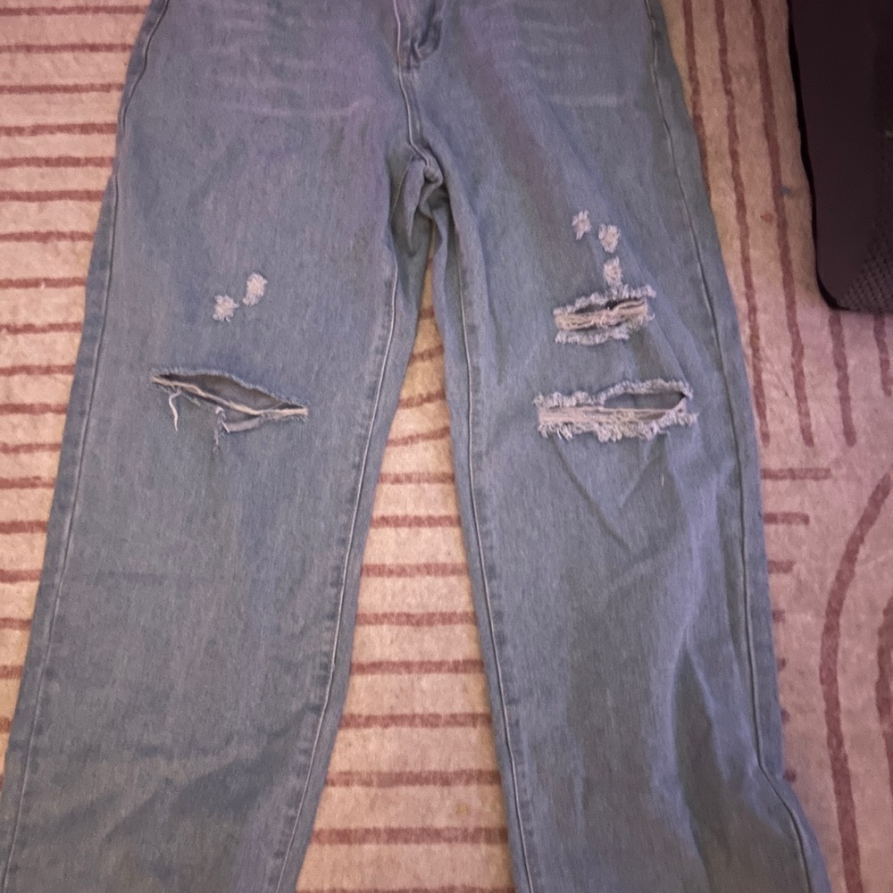 Distressed Blue Jeans